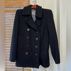 Men’s navy blue wool Schott peacoat.
